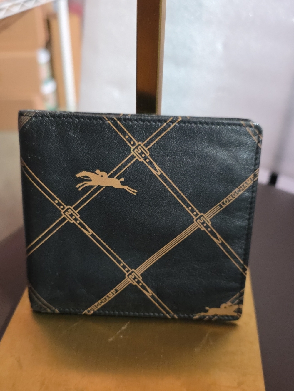 Longchamp Black and Gold Printed Leather Wallet